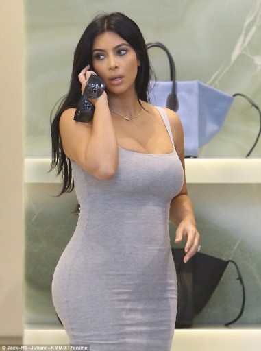 Kim Kardashian wears a skintight dress as she goes shopping in Beverly Hills on June 12, 2015