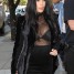 Kim Kardashian in Velvet, Mesh, and Wedge Boots