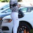 Jennifer Lopez in Mesh Louboutin Booties and White Ripped Jeans
